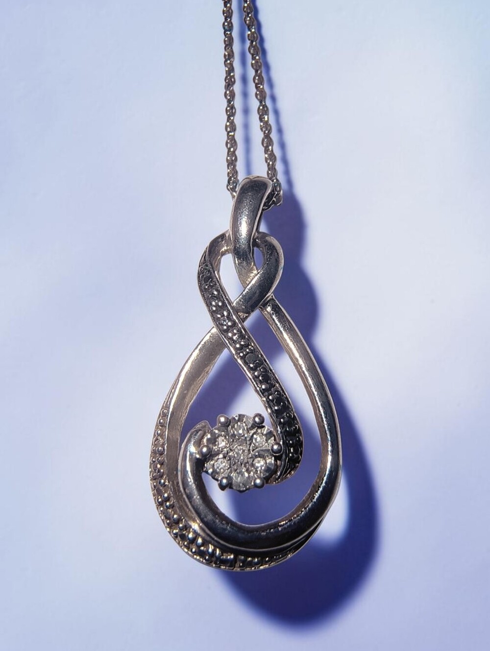 Sterling Silver Infinity Teardrop Necklace with Clear Stones & Black Pave Accent